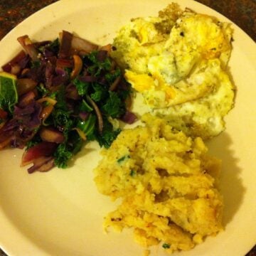 plate of healthy food with eggs roasted garlic mashed cauliflower