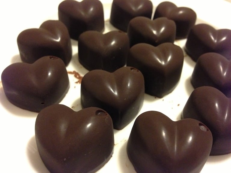 close up of heart shaped homemade paleo chocolates 