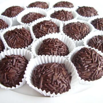 close up of numerous Brazilian chocolate  truffles also known as Brigadeiro