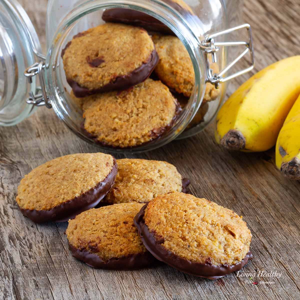 glass jar on its side filled with banana cinnamon cookies