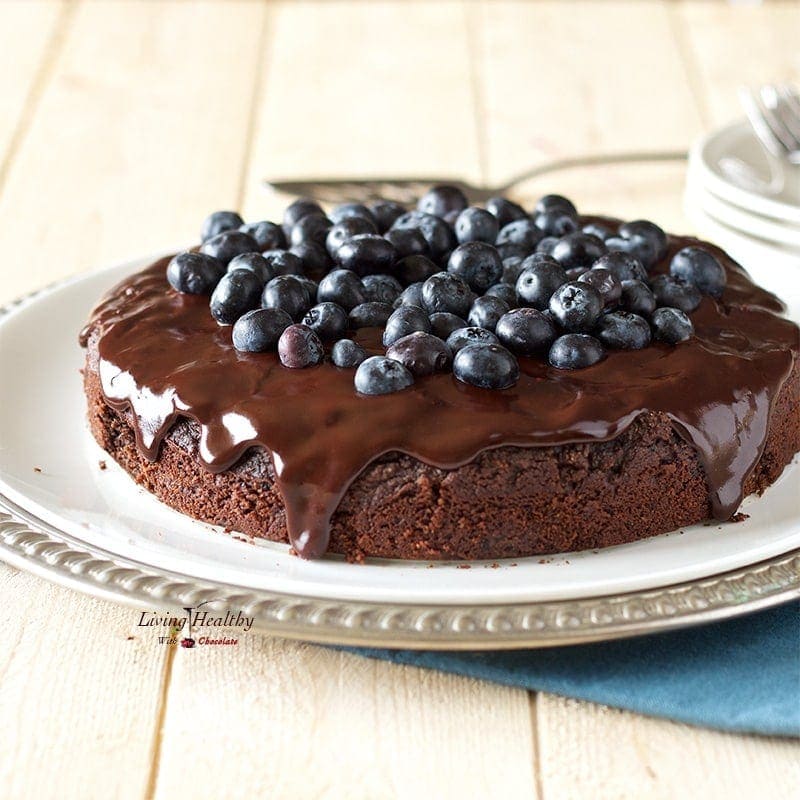 Blueberry Chocolate Cake (gluten-free, dairy-free, Paleo) by #LivigHealthyWithChocolate. This cake is super moist, soft, and fudgy!