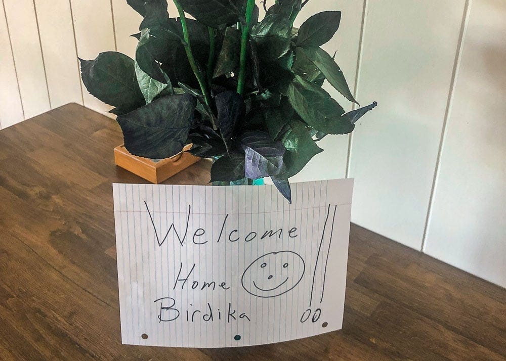 Flowers with love note welcoming me home